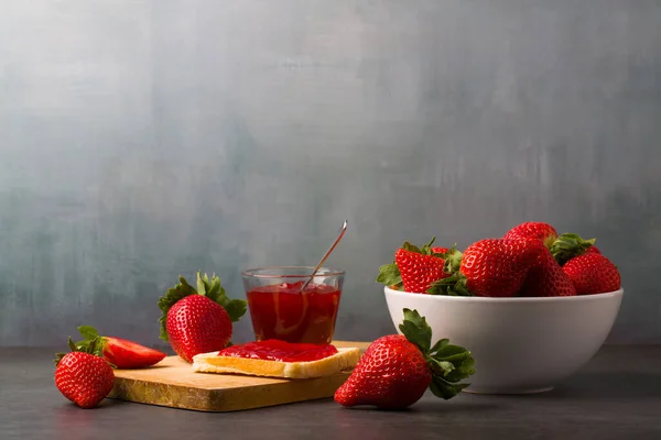 Strawberry jam is made from strawberries, This jam can be used for spreading white bread, filling cakes, etc.