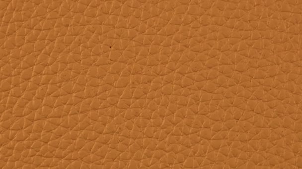 Orangefarbener Lederhintergrund Zeitlupe Makro High Detaillierte Videos Muster Textur Oberfläche — Stockvideo