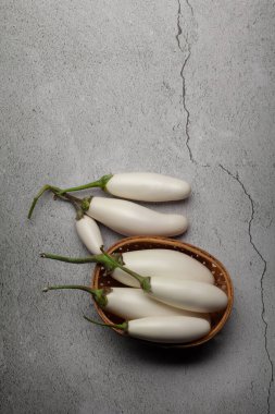 Close-up of organic white fresh Eggplant or Brinjal (Solanum melongena), isolated on a marble background. clipart