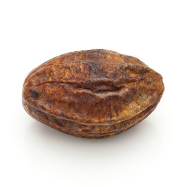 Beyaz arka planda izole bir organik Inknut veya Harr (Terminalia Chebula) makro çekim.