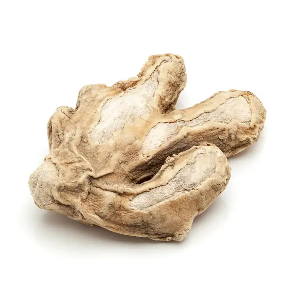 Stock image Macro closeup of a Dried Ginger root or Sonth (Zingiber officinale) isolated on white background.