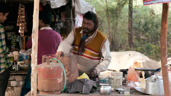 Stock image A Local street tea vendor preparing tea. India.