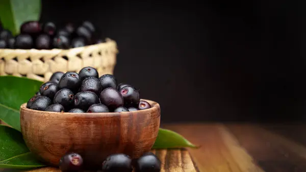 stock image Close-Up of collection of Indian Ayurvedic medicinal fresh organic fruit jamun (Syzygium Cumini) or black plum, with peeled seed , half cut fruit,  isolated in white background. 