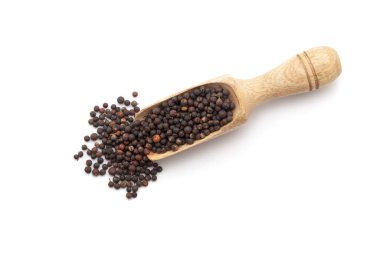 Top view of a wooden scoop filled with Organic False Black Pepper (Embelia ribes) or Baibadang. Isolated on a white background. clipart