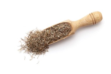 Top view of a wooden scoop filled with dry Organic Pitpapra or Varatika (Fumaria Indica) herb. Isolated on a white background. clipart