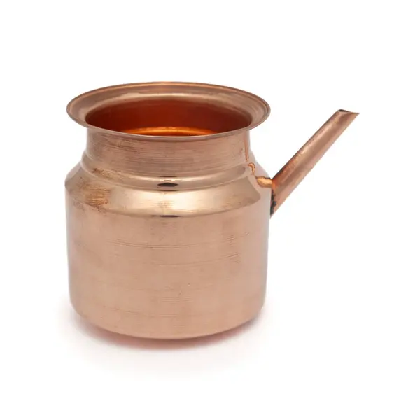 stock image A copper 'Ganga Sagar Kalash' (Karwa) used in traditional Indian rituals of Karwachauth Pooja, placed on a white background, symbolizing cultural and religious significance.