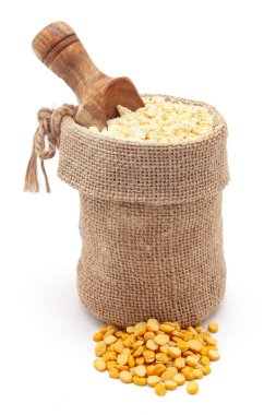 Close-up of Organic Chickpea Flour (Cicer arietinum) or besan in a jute bag with a scoop, Isolated on a white background. clipart