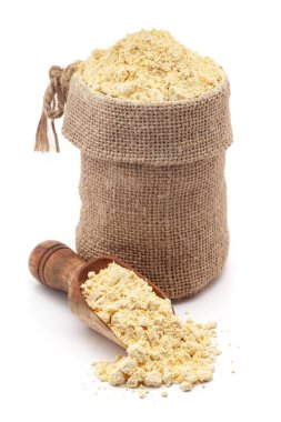 Close-up of Organic Chickpea Flour (Cicer arietinum) or besan in a jute bag and on a scoop, Isolated on a white background. clipart