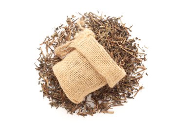 Close-up of dry organic Spearmint or Pudina (Mentha Spicata) stems and leaves in a jute bag on a heap of Pudina, isolated on a white background. clipart