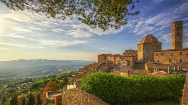 Volterra town skyline, church and panorama at sunset. Province of Pisa, Tuscany, Italy clipart