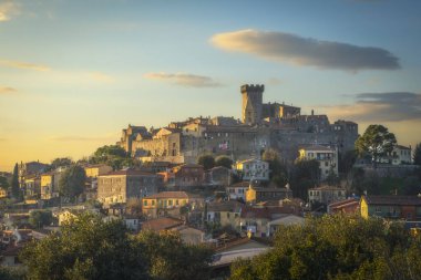 Capalbio medieval village skyline at sunset. Maremma, province of Grosseto, Tuscany region, Italy clipart