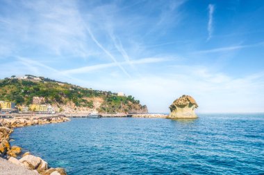 The mushroom rock of Lacco Ameno on the island of Ischia. Travel destination in Phlegraean Islands archipelago in Gulf of Naples, Campania region, Italy clipart