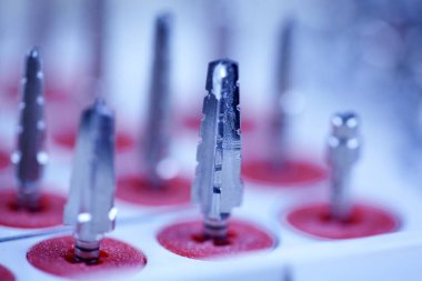 Rotary Dentistry Tools. Dental tools, tongs of various shapes. drill, dentist, dentistry, medical background. Shallow depth of field