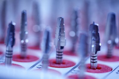 Rotary Dentistry Tools. Dental tools, tongs of various shapes. drill, dentist, dentistry, medical background. Shallow depth of field