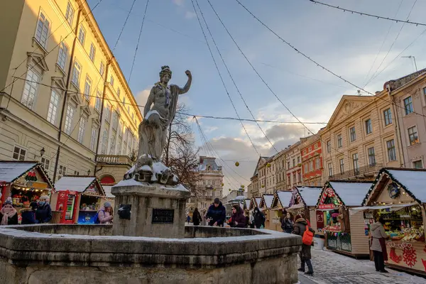 stock image Lviv, Ukraine - January 15, 2021: Lviv Christmas Market. Amphitrite Fountain. Feel the magic of the holidays. A magical winter wonderland