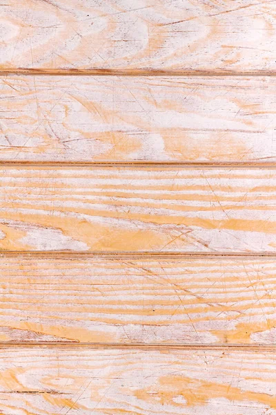 Weathered white wood texture background. white stained wooden billboard close-up. Horizontal direction boards. Wavy pattern of wood fibers.