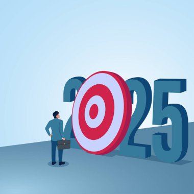 Evrak çantası taşıyan bir adam, 2025 sayıları arasında bir hedefe bakıyor. Yeni yıl hedefleri, yeni hedefler ve yeni zorluklar için resim.