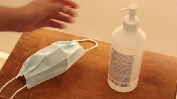 Sanitizing Hands Grabbing Face Mask Pandemic Close — Stock Video