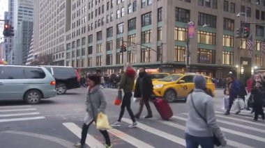 People Walking On Zebra Crossing Near Cars - Pan - Left To Right