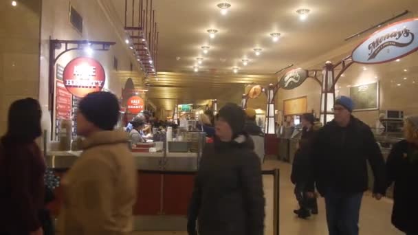 People Walking Food Stands Underground Passage Pan Left Right — Stock video