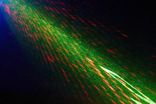 Koyu Mavi Bir Arkaplanda Yeşil Kırmızı Işık Huzmeleri — Stok fotoğraf