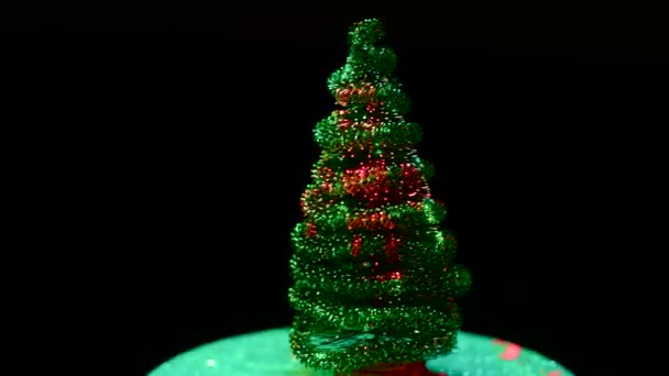 Christmas Tree Blinking Animation Rotates Black Background — Stock Video
