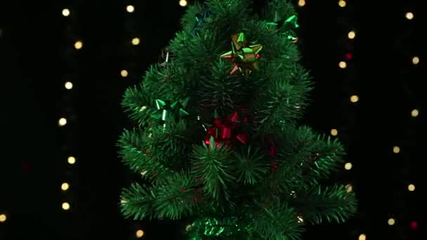 Uma Árvore Natal Verde Decorada Com Raios Luz Estampados Piscando — Vídeo de Stock