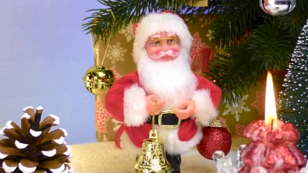Christmas Motion Closeup Santa Claus Burning Candle Christmas Trees — Stock Video