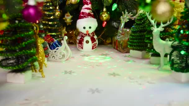Christmas Motion Snowman Small Christmas Trees Reindeer Swinging Decorations Backdrop — Stock Video