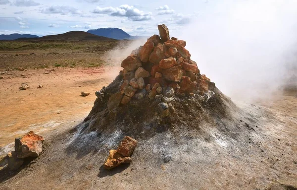 stock image Namafjall, Gjaldskylda, Iceland - 2nd July 2022:Fumarole gas rising producing a conical chimney