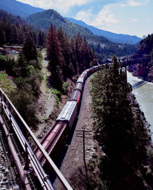 Cisco crossing, Canada - 22nd June 2023:The Canadian National Railway train at the Cisco Crossing clipart