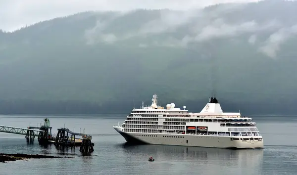 stock image Icy strait Point, Hoonah, Alaksa - Silver Whisper cruise ship coming alongside to dock