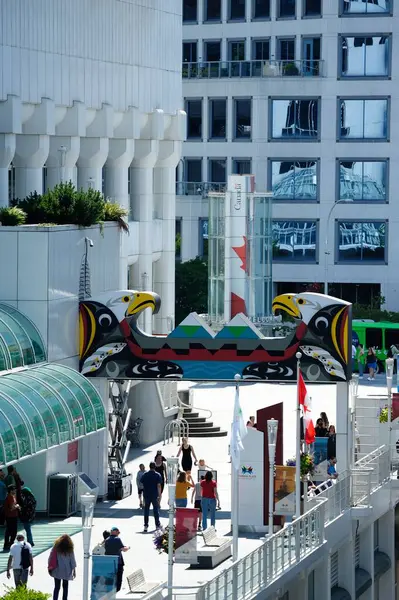 Stock image Canada Place, Vancouver, Canada - 23rd June 2024:Visitors viewing the cruise ship from the walkway