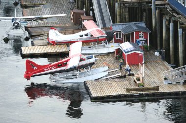 Sitka, Alaska, USA - 29th June 2024:Pushing Beaver Sea plane N1018U in to the harbour clipart