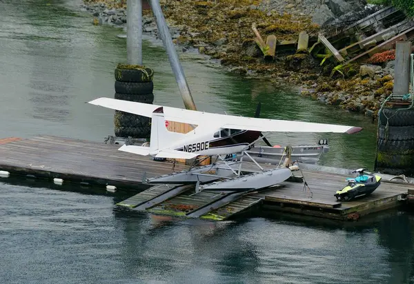 Stock image Sitka, Alaska, USA - 29th June 2024:Sea plane N6590E on its mooring in the harbour