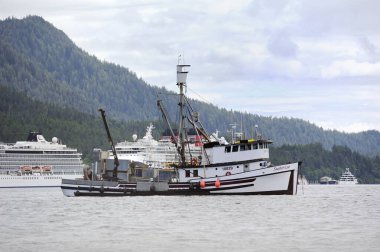 Ketchikan, Alaska, USA - 1st July 2023:Sunrise fishing trawler at anchor in the harbour clipart