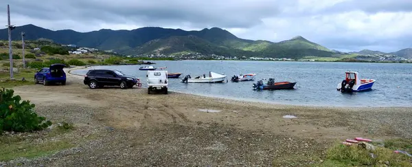 stock image Saint Barthelemy Channel, St Maarten - 2nd February 2024:Fisherman trucks on the beach to take the daily catch to market