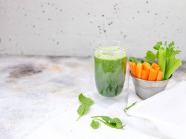 smoothie with vegetable sandwich on a concrete background