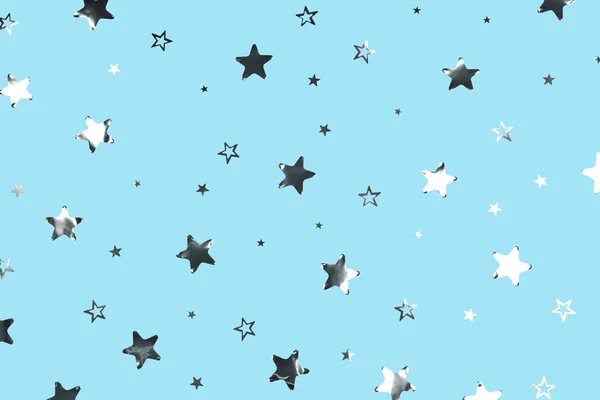 Silver stars and sparkles on the blue background. Festive or party backdrop.