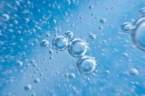 Water. Movement of air bubbles blue beautiful abstract underwater background