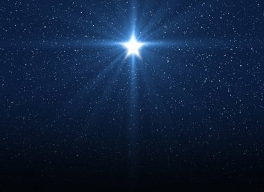 Parlak Yıldız. Beytüllahim 'in İsa' nın Doğuşu 'nun Noel yıldızı. Koyu mavi yıldızlı gökyüzünün arka planı.