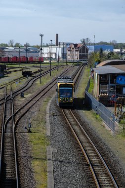 Railway outdoors on beautiful summer day. Industrial landscape with rails and railway. clipart