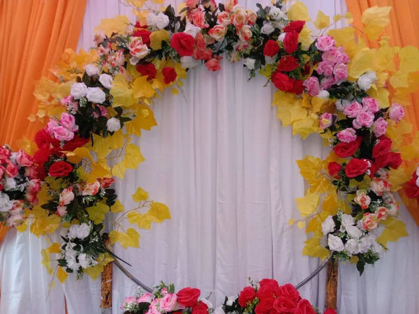Wedding stage decoration with artificial colorful flower decoration