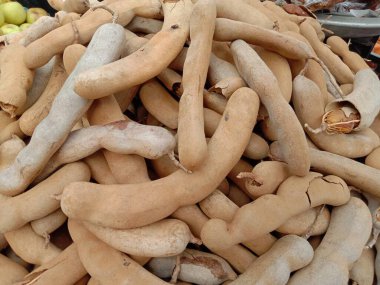 tasty and ripe tamarind stock on shop for sell are cash crops