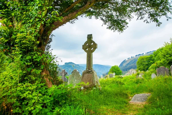 Ancient celtic cross in Glendalough, Ireland