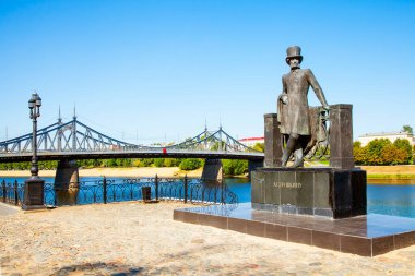 Tver, Russia - August 22, 2023: Monument to the great Russian poet Alexander Pushkin on the embankment in Tver clipart