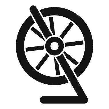 Geleneksel dönen tekerleğin siyah ve beyaz silueti, tekstil yapımında ikoniktir