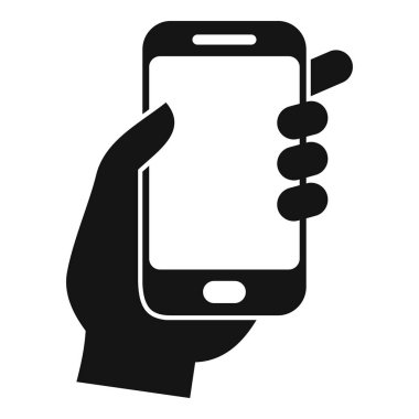 El, soketi tutarak akıllı bir telefonu tutarken yandan bakıyor.