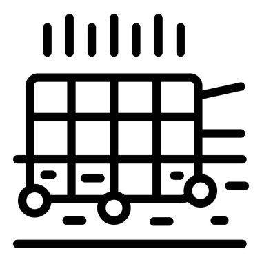 Boş metal kafes tramvayı tekerlekler üzerinde hızla ilerliyor. Yerde izler bırakıyor.