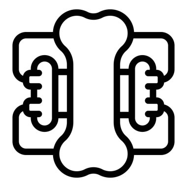 Ortopedi cerrahı kırık kemiği onarmak için vida ve plaka yerleştiriyor.